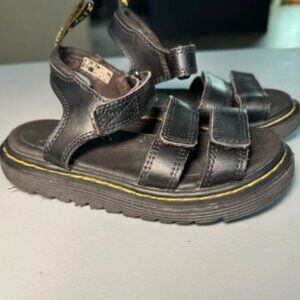 Dr. Martens Black Kids Sandals with Yellow Stitching